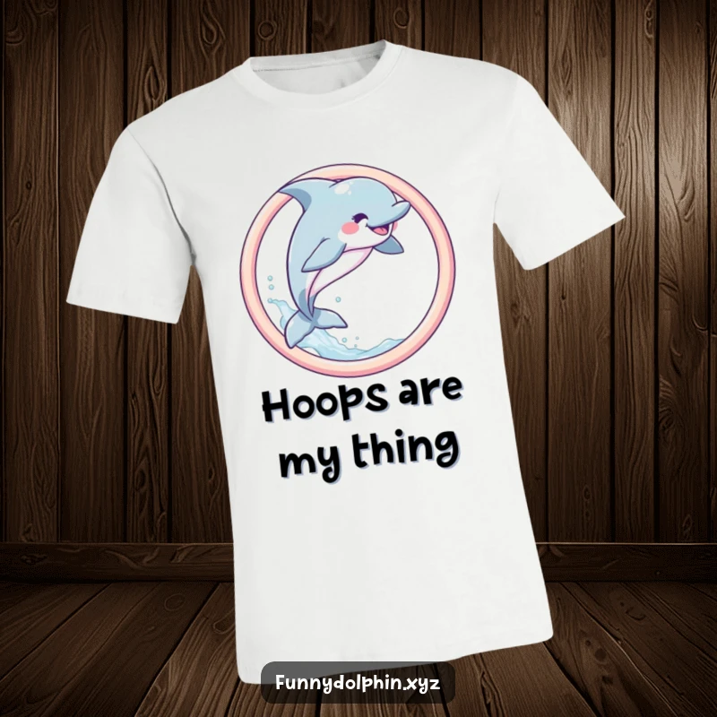 Funny Dolphin T-Shirt depicting a happy dolphin leaping joyfully through a pastel hoop with a dynamic spray of water.