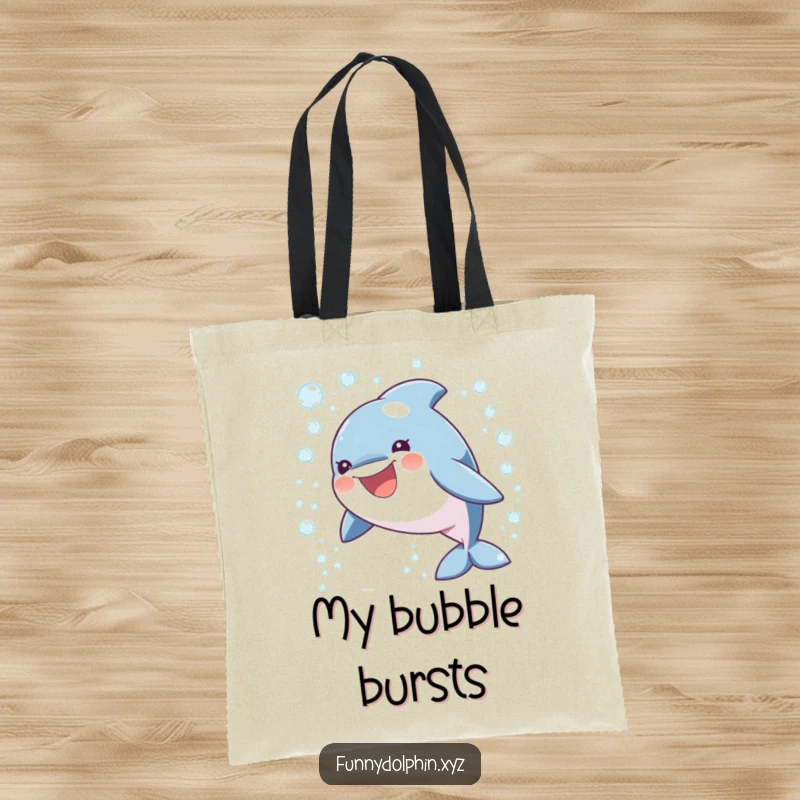 Funny tote bag showing a round, ecstatic dolphin leaping through a vibrant shower of sparkling bubbles, perfect for beach trips.